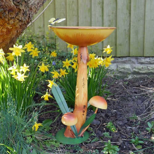 Large mushroom sculpture bird - mushroom,